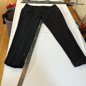 GUCCI size 44 black dress pants pockets & stretch fits size 10-12